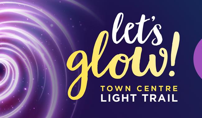 A banner image promoting Let's Glow 2024. A navy banner image with a purple swirl to the left hand side. Central text reading Lets Glow town centre li