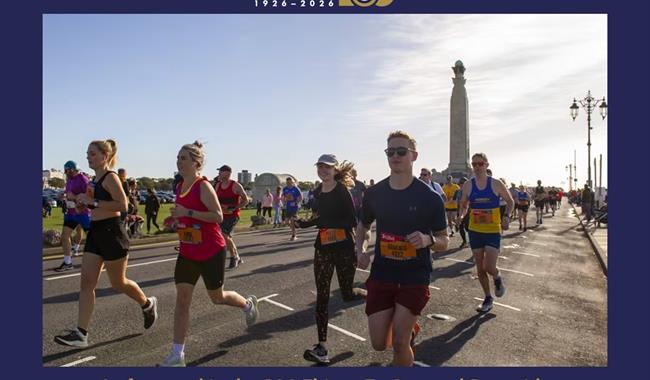 People taking part in the Great South Run, going past the War Memorial on Southsea Seafront