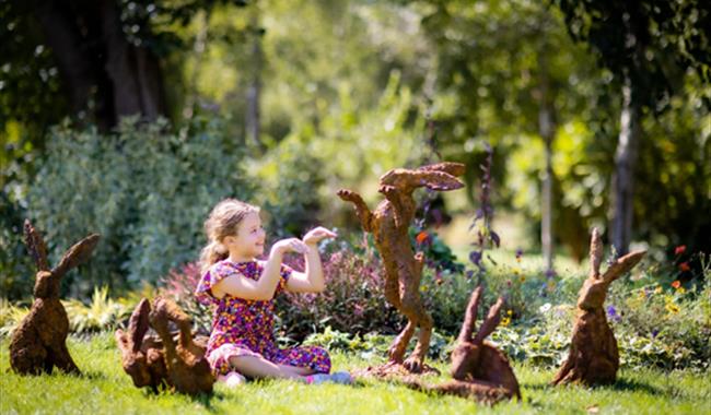 Girl with Hares