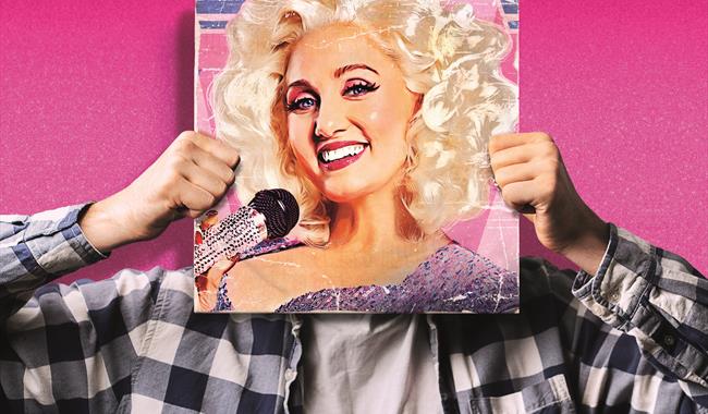 Against a bright pink sparkly background, someone holds a record in front of their face. The record cover shows a painting of Dolly Parton with bright