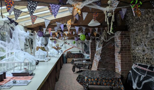 A garden classroom depicting Halloween activities