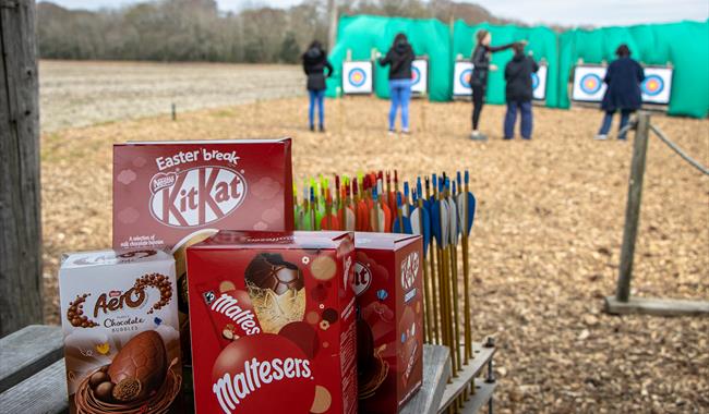 Easter eggs in front of an archery target