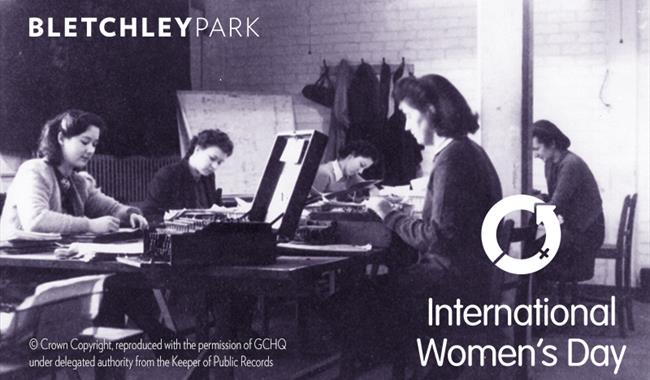 A picture of women at work at Bletchley Park during World War Two. Image includes an Enigma machine on a desk.