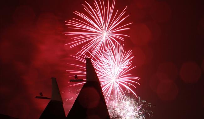Fireworks display against the backdrop of the iconic Kent hops rooftops.