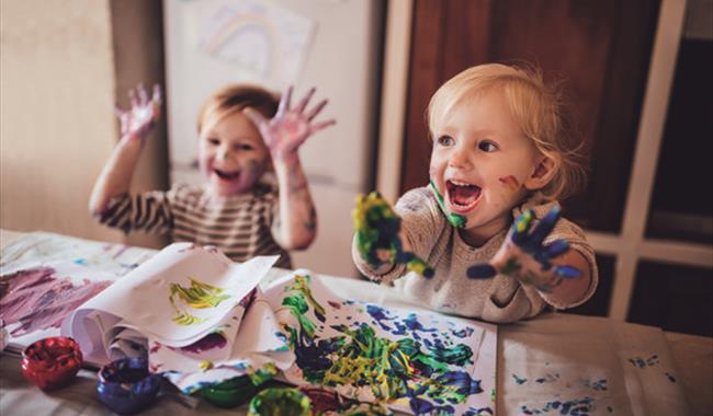 Children playing with paint