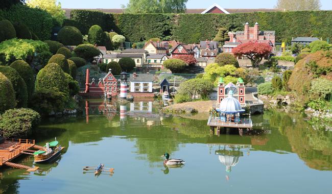 View over the model lake at Bekonscot Model Village, Buckinghamshire