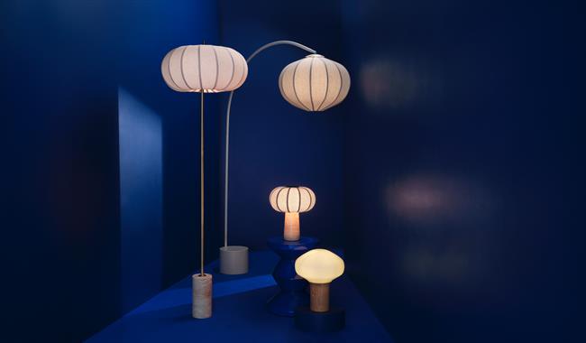 Lamps in a dark blue studio John Lewis