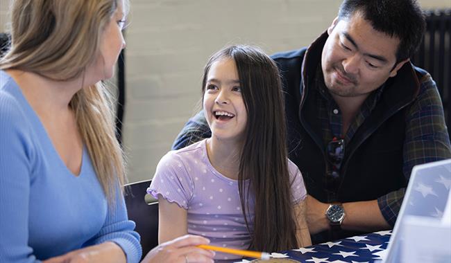 A family together enjoying activities at Bletchley Park