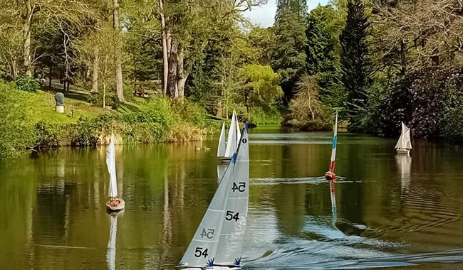 Model Boats on the Lake at Leonardslee Lakes and Gardens in West Sussex