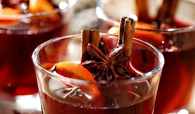 Glasses of mulled wine - bringing festive cheer to Garlic Farm I Love Wight Christmas Market