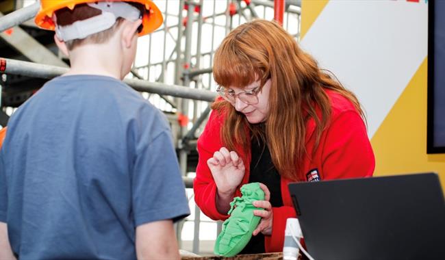 One of our conservation team with young visitors