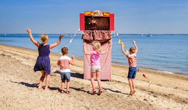 Punch & Judy show on the beach at Osborne, Isle of Wight, historic attraction, family fun, children's activities, summer event, what's on