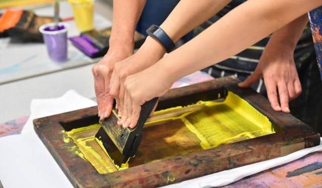Detail shot of screenprinting in action