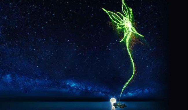 A vast expanse of dark blue sea and a deep blue night sky filled with stars. There is a singular island in the water, with the moon rising from the ho