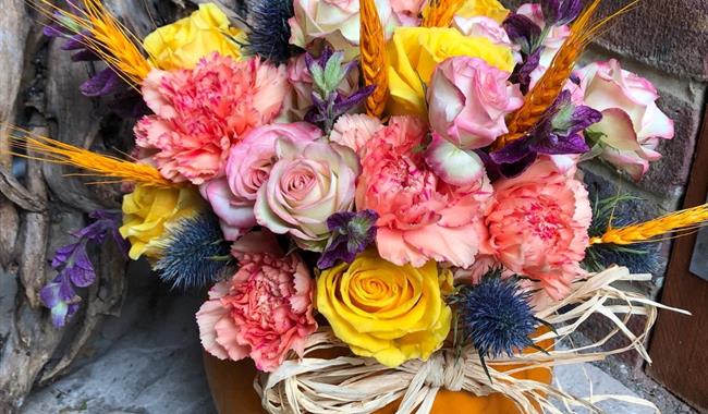 Flower arrangement in a pumpkin