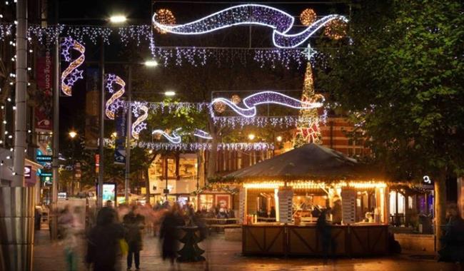 Reading Christmas Market with festive lights and stalls selling tasty treats