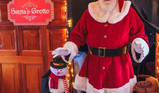 Santa by his grotto on The New Orleans