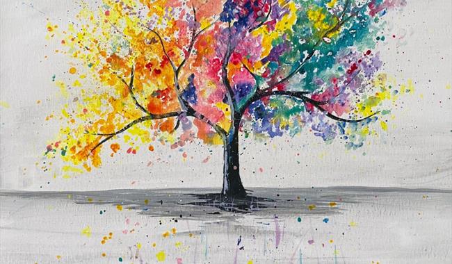 Painting of a tree in rainbow colours with splatters on a plainbackground