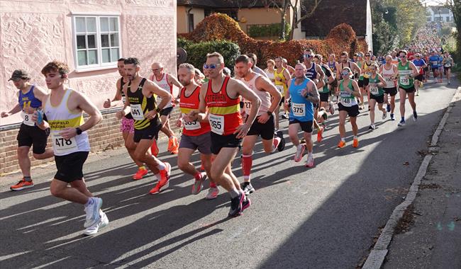 Participants running on course