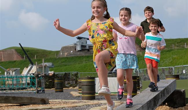 Children enjoying the assault course at Fort Nelson