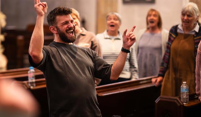People participating in The Gospel Experience