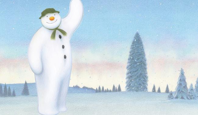 The Snowman waving in the snow