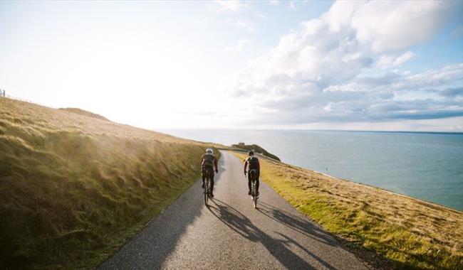 Tim Wiggins riding on the Isle of Wight, Joyride Festival, cycling, wellness, health & wellbeing, food, music, what's on, event