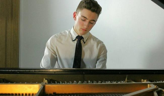 Image: Henry Cash playing piano