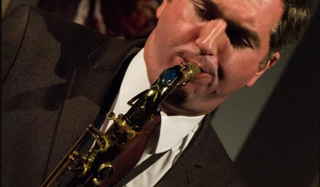 Image: Simon Spillet playing the saxaphone