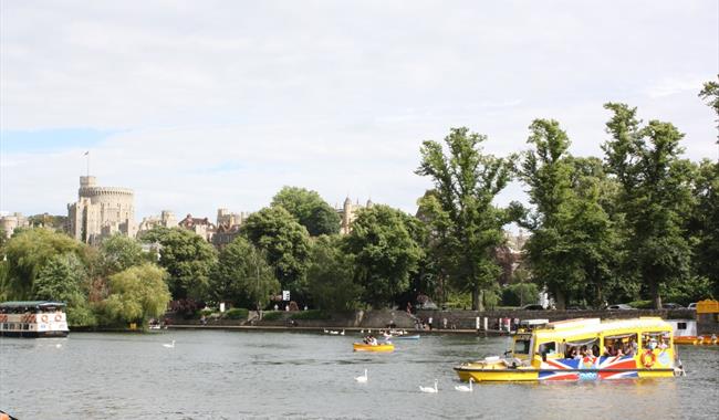 Windsor Duck Tours on River Thames with Windsor Castle in distance