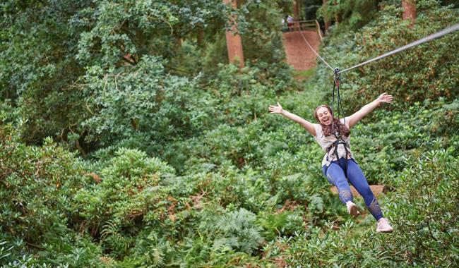 Women on zipline at Leeds Castle, Kent