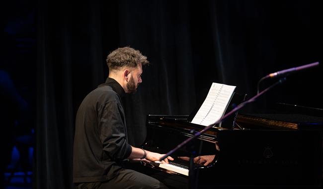 Image: Seann Wilkinson playing piano