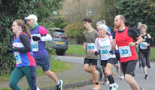 Participants running on course