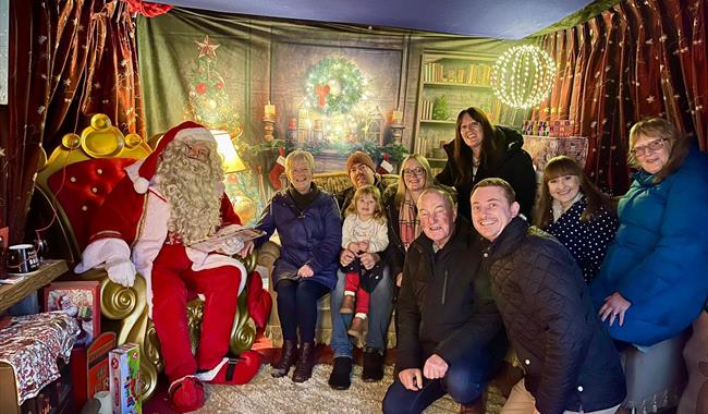 large family meeting farmer christmas