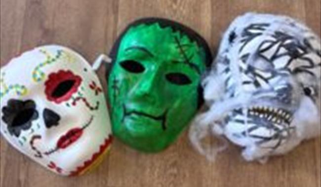 Row of halloween masks made