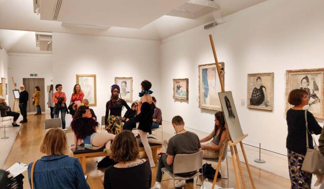 A group of happy participants in a Life Drawing session