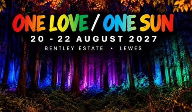 Colourful woodland setting at One Love / One Sun Festival 2027, Bentley Estate, East Sussex.