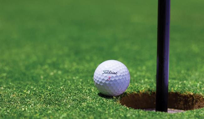 Golf ball by hole