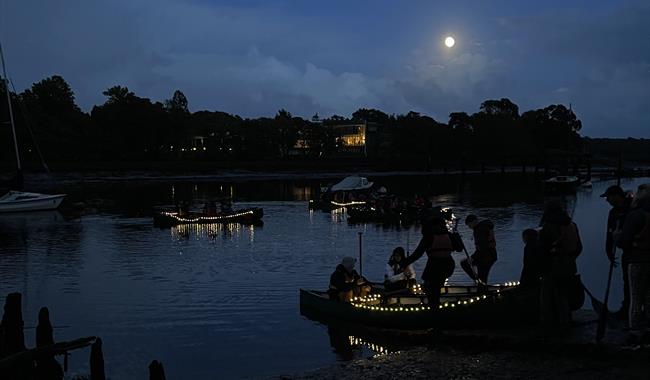 Canoe on the water under the moonlight