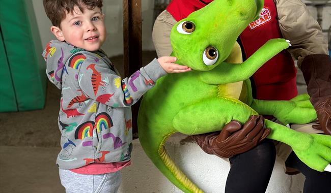 Boy meets dinosaur squeak