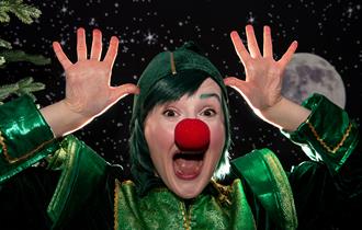 An elf with a red nose