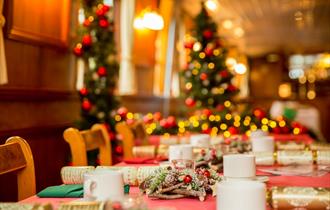 Windsor & Maidenhead Boat Company | The Georgian with table decorated for Christmas