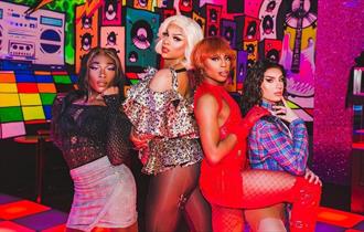 Photograph of four drag queens at Eden Portsmouth for the Bougie Drag Brunch