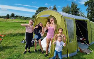 Family camping at Farmer Palmer's