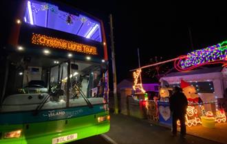 Southern Vectis bus in front of Christmas lights, Isle of Wight, event, what's on