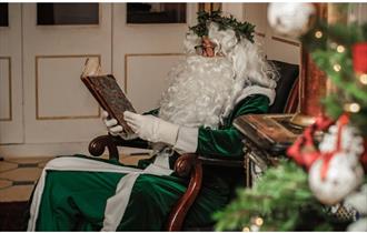 Father Christmas onboard HMS Warrior Credit NMRN