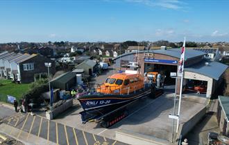 Selsey Lifeboat Station taken from an elevated height from a drone showing the all weather lifeboat on the apron