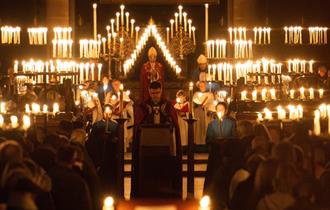 A service with lots of candles