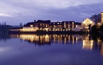 Macdonald Compleat Angler at night