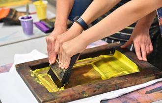 Detail shot of screenprinting in action